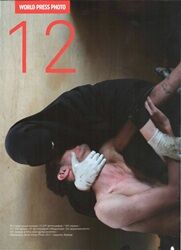 обложка книги World Press Photo 12 книга World Press Photo 12, автор: